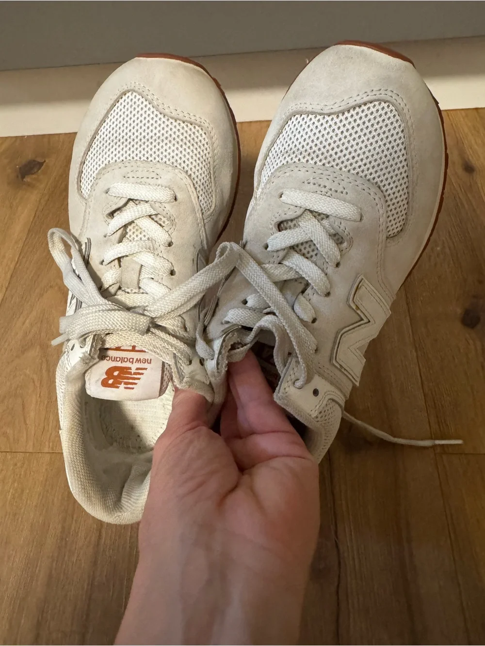 New Balance 574 Women's Cream Lace-Up Sneakers with Orange Accent